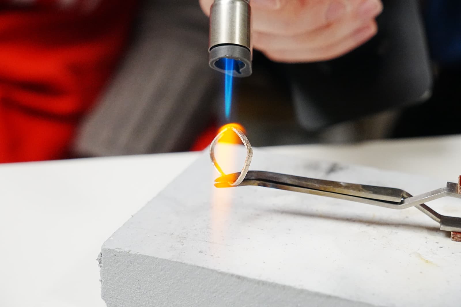 Forging a sterling silver ring at the PLAI bench